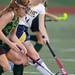 Huron's Jen Durbin fights for control of the ball with Saline's Sarah Ball during the first half at Saline on Thursday night. Melanie Maxwell I AnnArbor.com